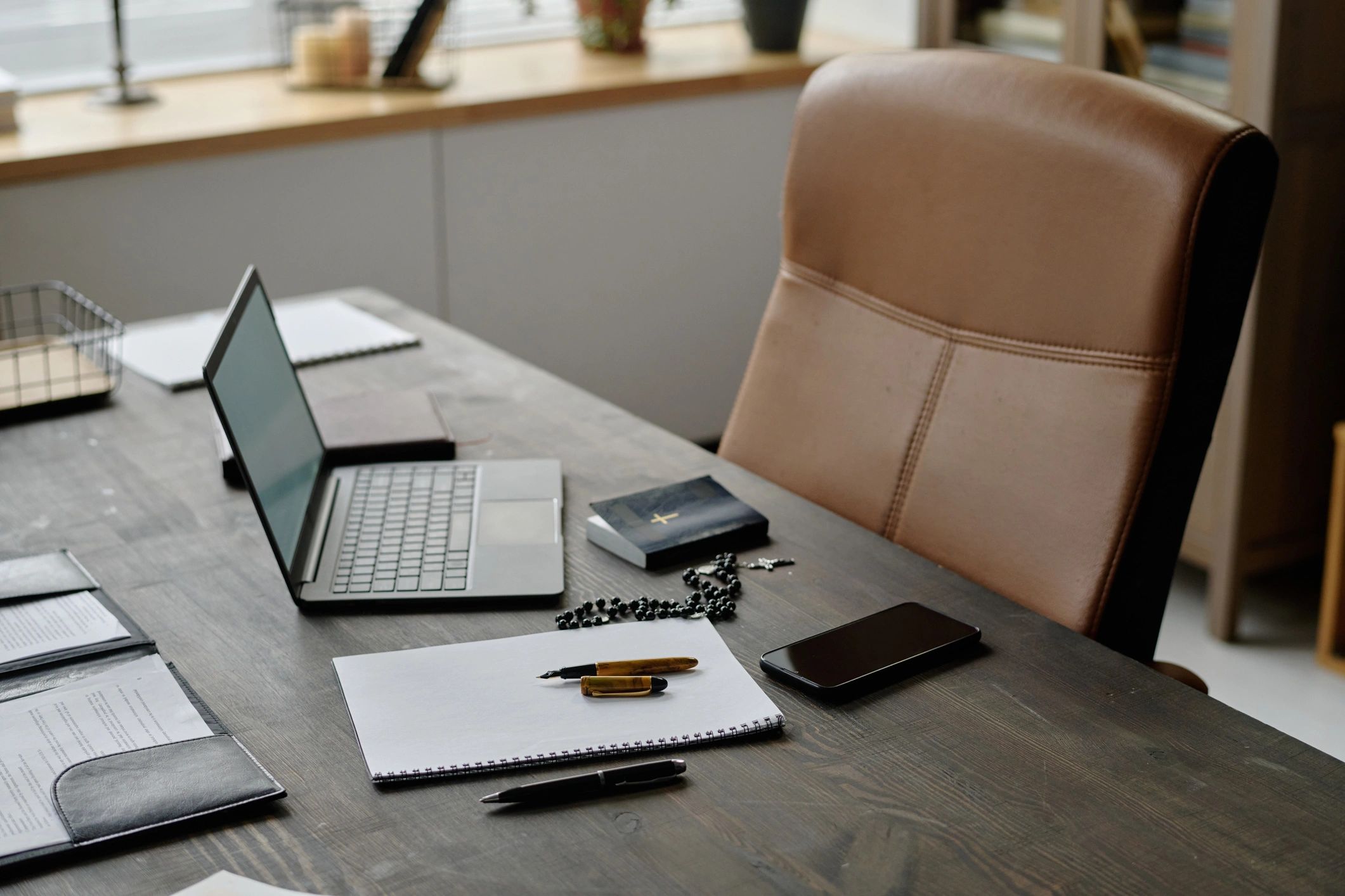 Professional accounting workspace with desk and digital tools